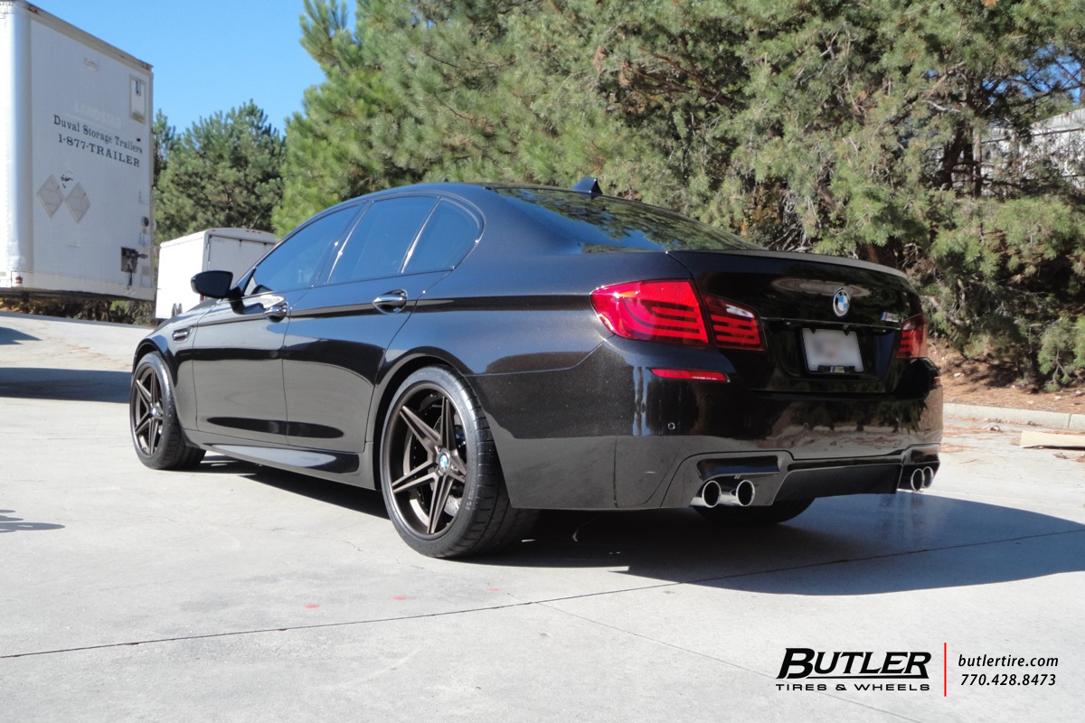 BMW M5 with 20in Niche Roma Wheels