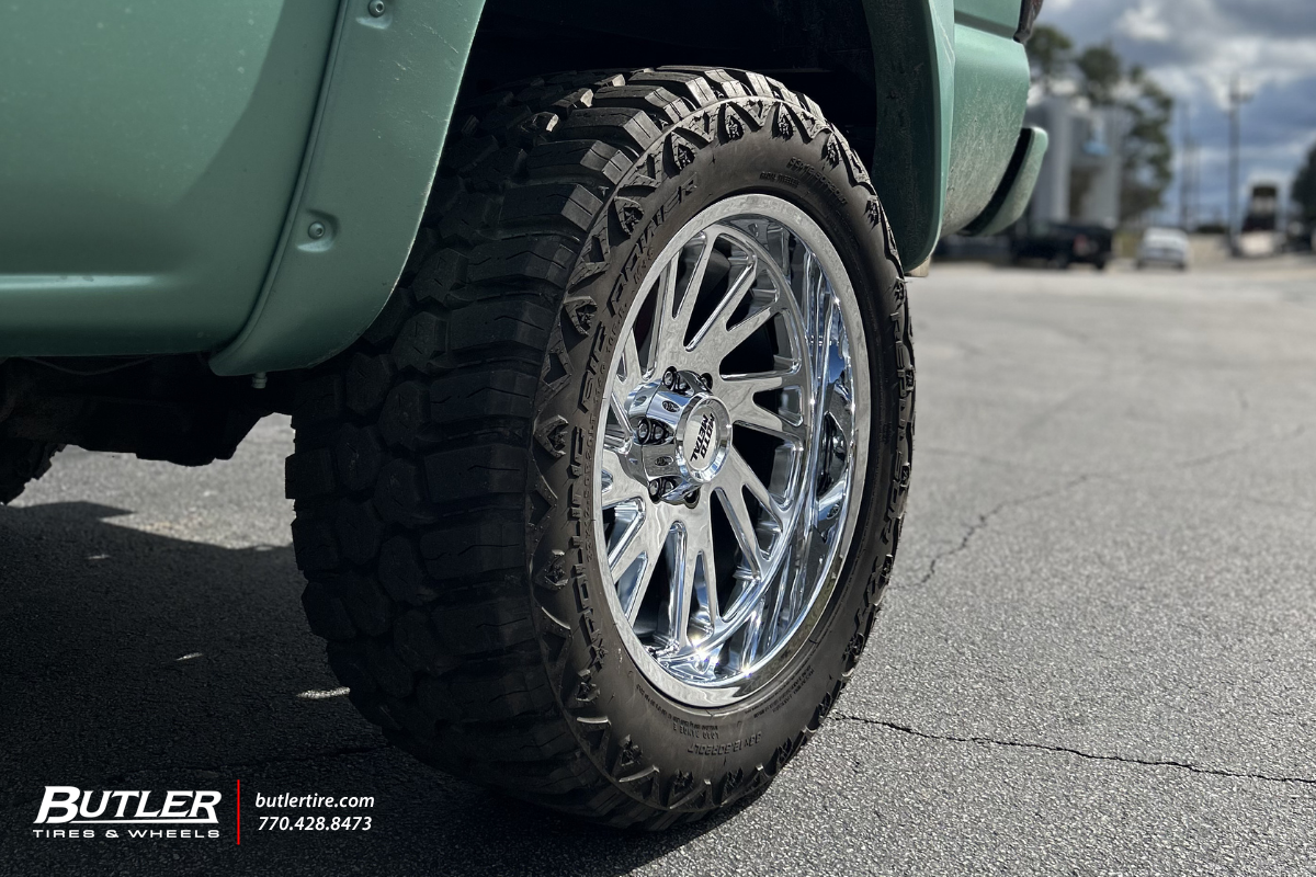 Chevrolet 1500 with 20in Moto Combat Wheels