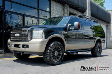 Ford Excursion with 20in Black Rhino Warlord Wheels