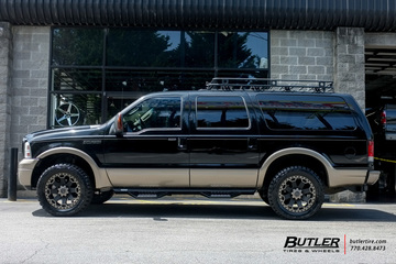 Ford Excursion with 20in Black Rhino Warlord Wheels