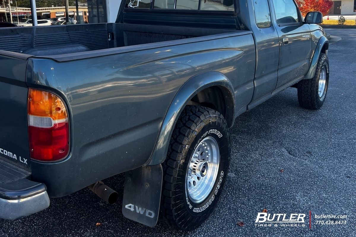 Toyota Tacoma LX with  15x8 American Outlaws Wheels