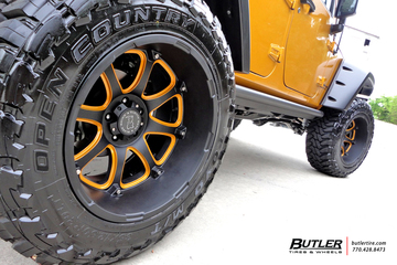 Custom Black and Orange Jeep Rubicon on Black Rhino Glamis Wheels